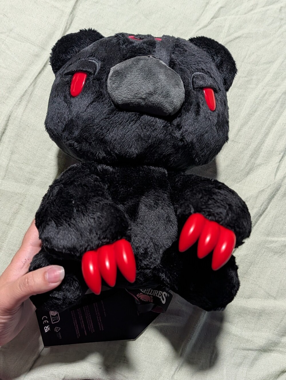Black Plush Bear Toy with Red Claws and Eyes